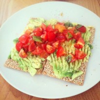 Post-run brunch of spelt crackers with avo and tomato